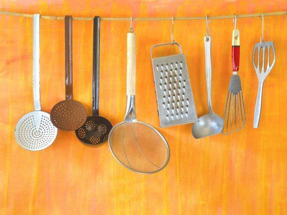 Vintage kitchen utensils hanging, cooking, food preparation, vintage kitchen concept, free copy space