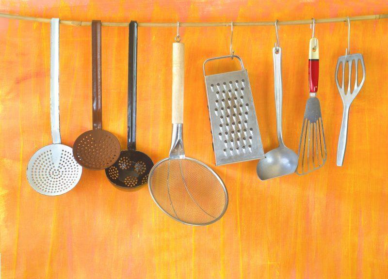 Vintage kitchen utensils hanging, cooking, food preparation, vintage kitchen concept, free copy space