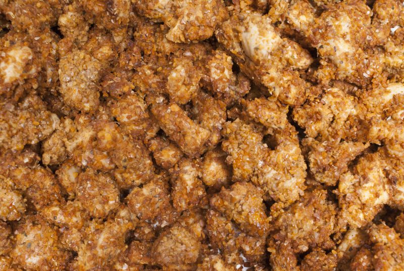 close up of pile of chickpea crusted chicken meteorites