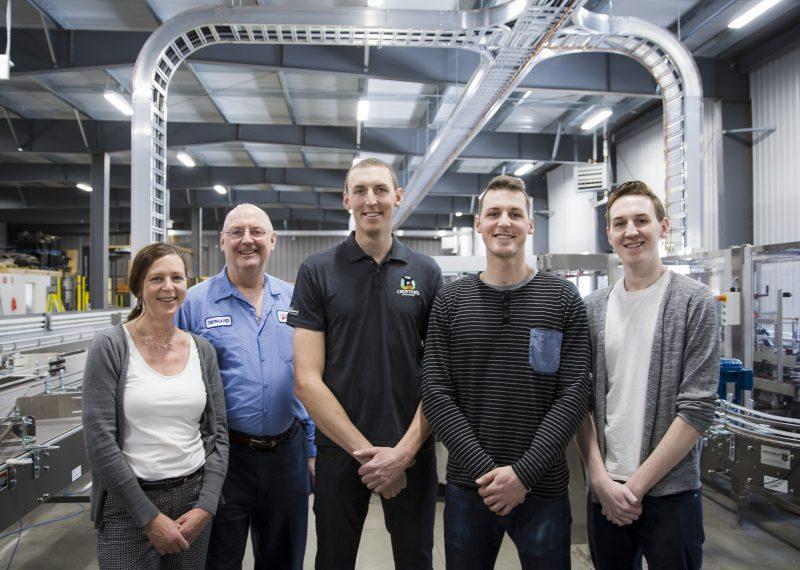 team of 5 people in crofters production facility