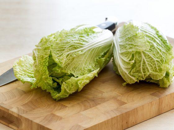 napa cabbage on wooden cutting board
