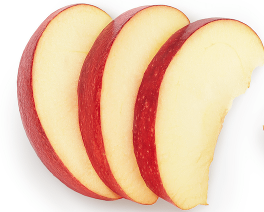 3 slices of a red apple laid on a white background