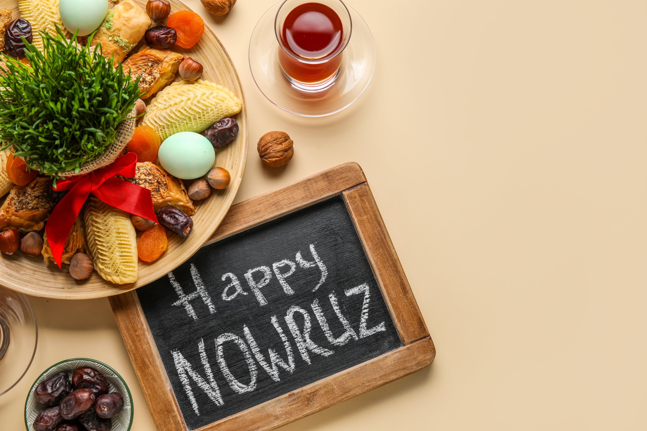 Chalkboard with text HAPPY NOWRUZ