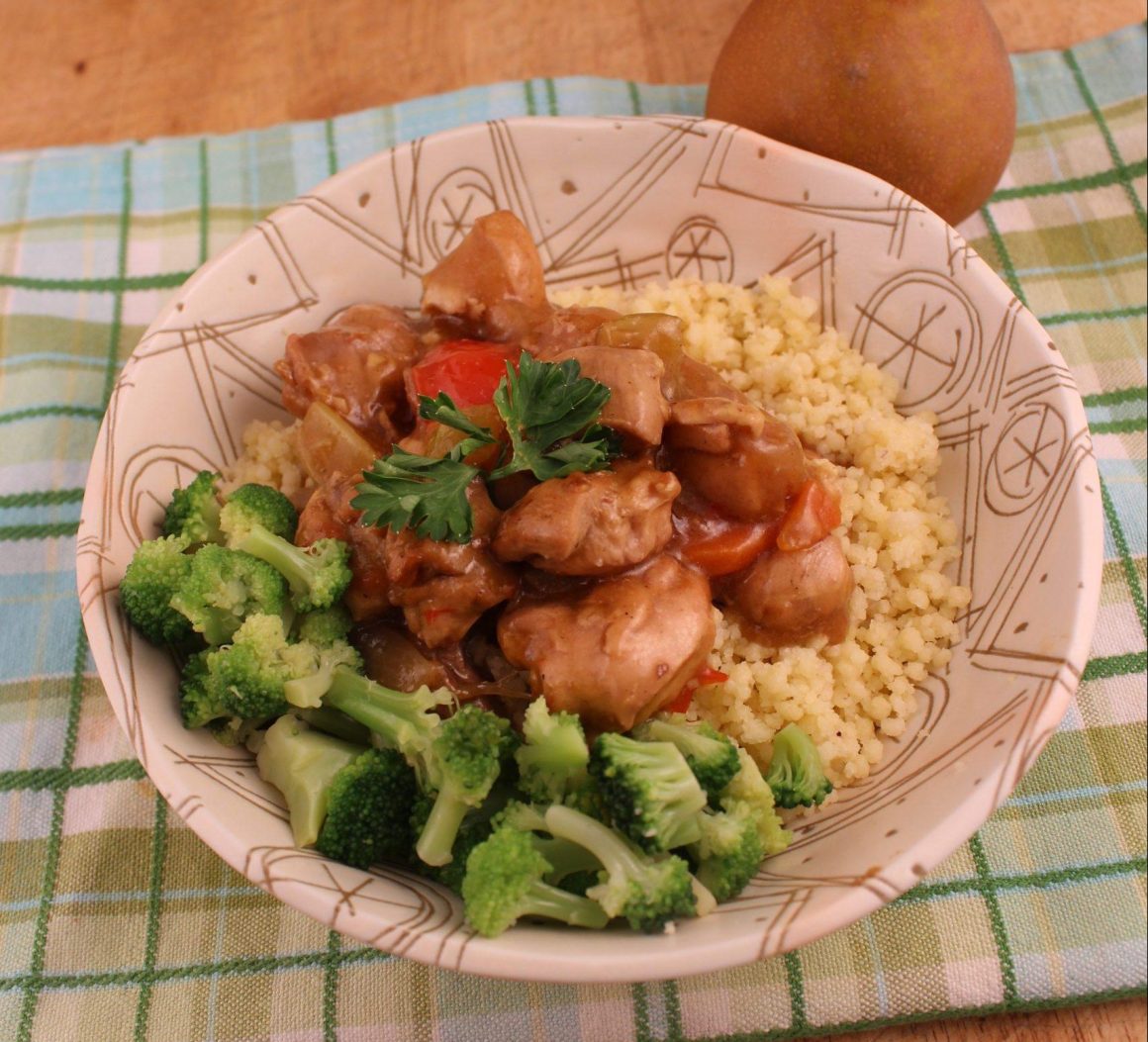 tong fu sweet and sour chicken dish served with rice and broccoli
