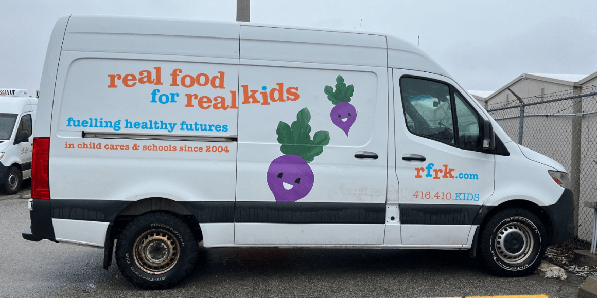 Newer RFRK white delivery van featuring purple beet character used for for child care catering in Toronto