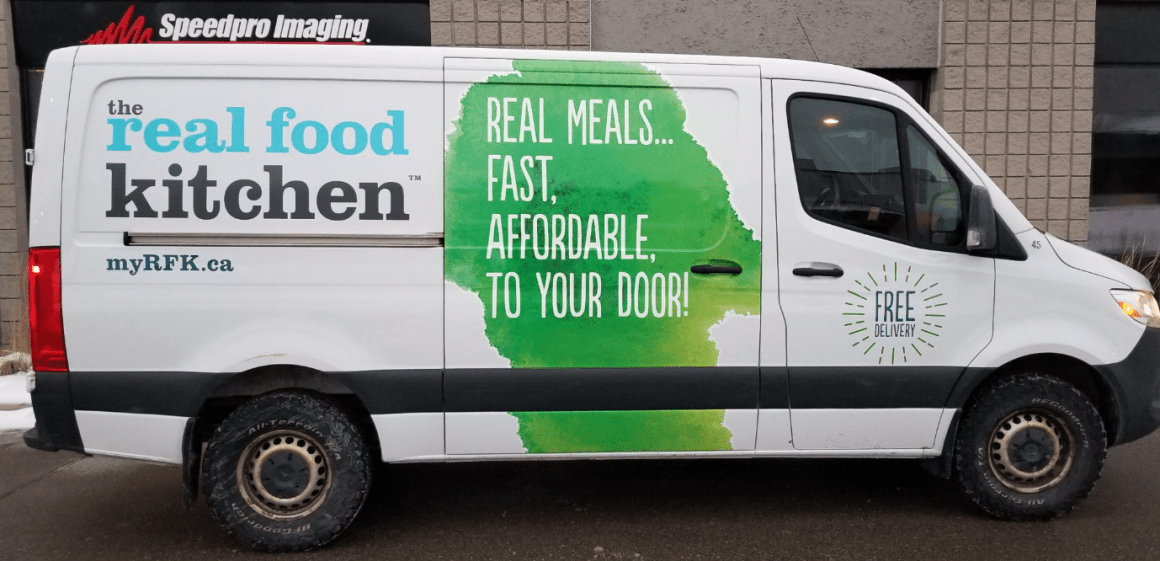 White Real Food Kitchen van for Real Food for Real Kids home delivery meals in Toronto