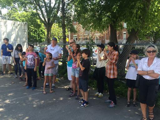 Group of people gathering outside for Dovercourt games