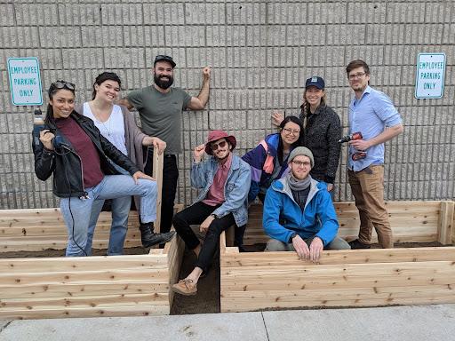 Group of people working to build garden beds RFRK Saulter facility 2019