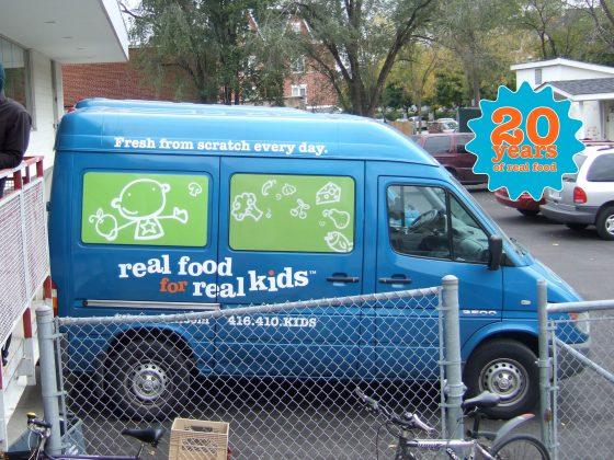 blue and green real food for real kids child care catering delivery van