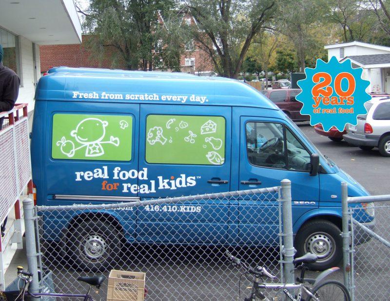 blue and green real food for real kids child care catering delivery van