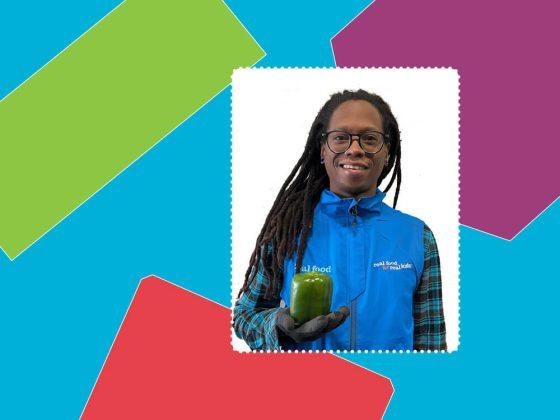 man holding produce in front of white background with colourful purple green blue red border