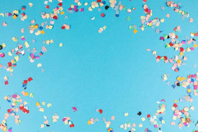 blue background frame with confetti