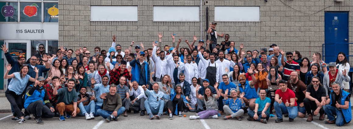 RFRK group staff shot outside facility An all staff group photo outside the REal Food for Real Kids kitchen to celebrate their 20th birthday