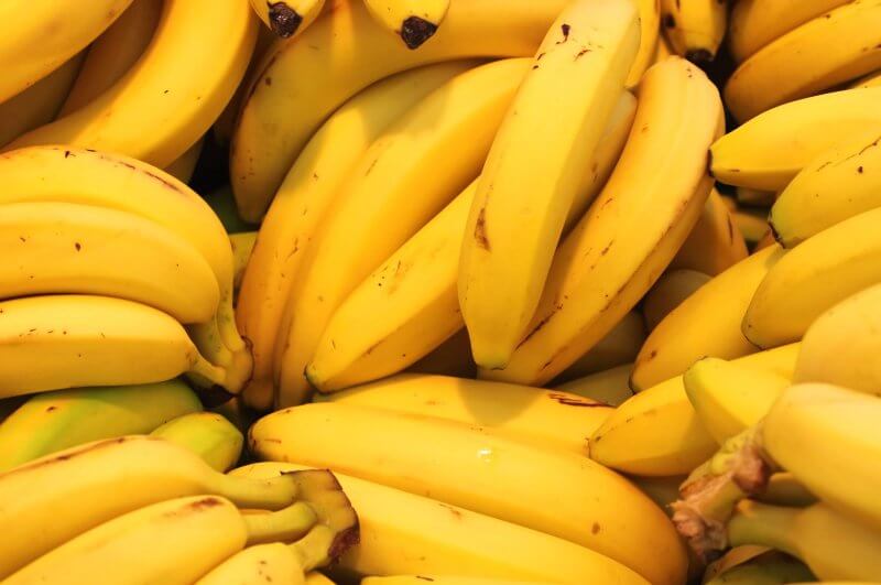 close up of bunches of bananas