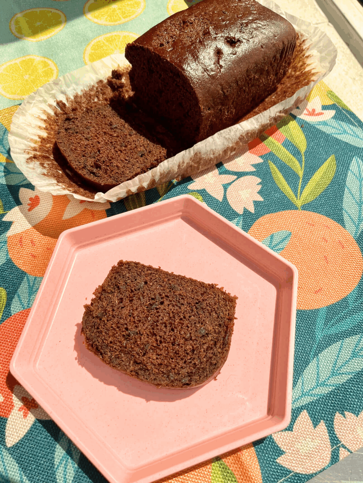 RFRK's Cocoa Beet Loaf sliced with separate slice on a pink plate
