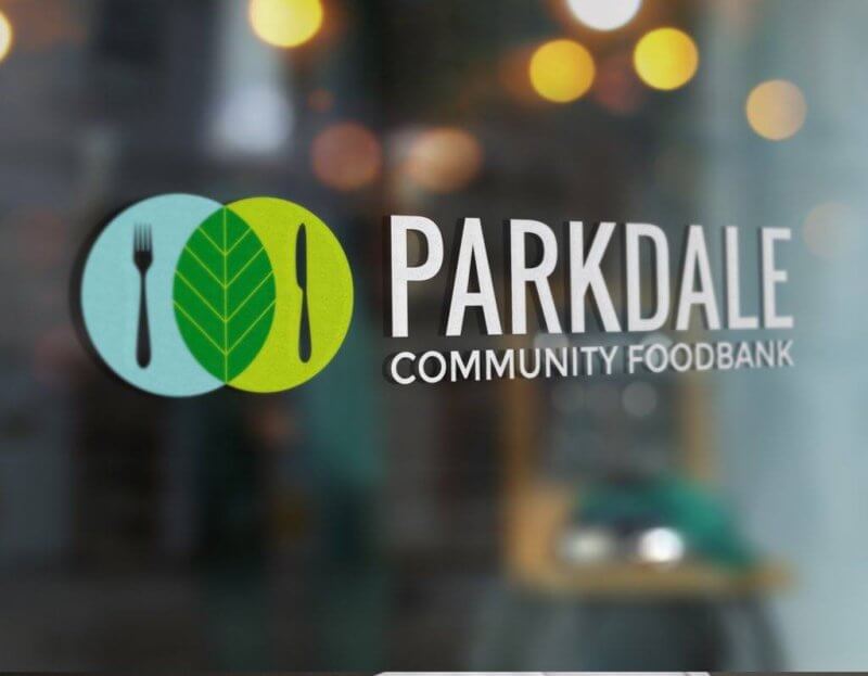 A glass pane featuring the logo of Parkdale Community Food Bank