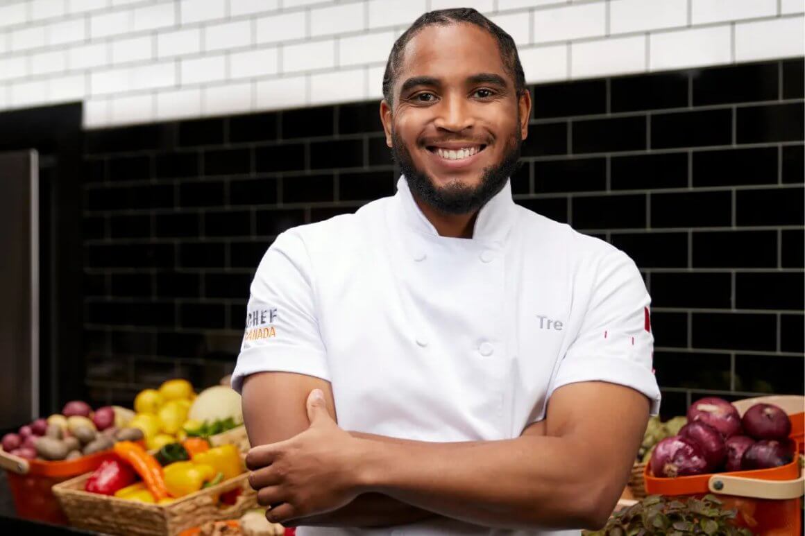 Honouring Black History Month 2026 1 tre sanderson top chef canada winner smiling for photo wearing chef's jacket