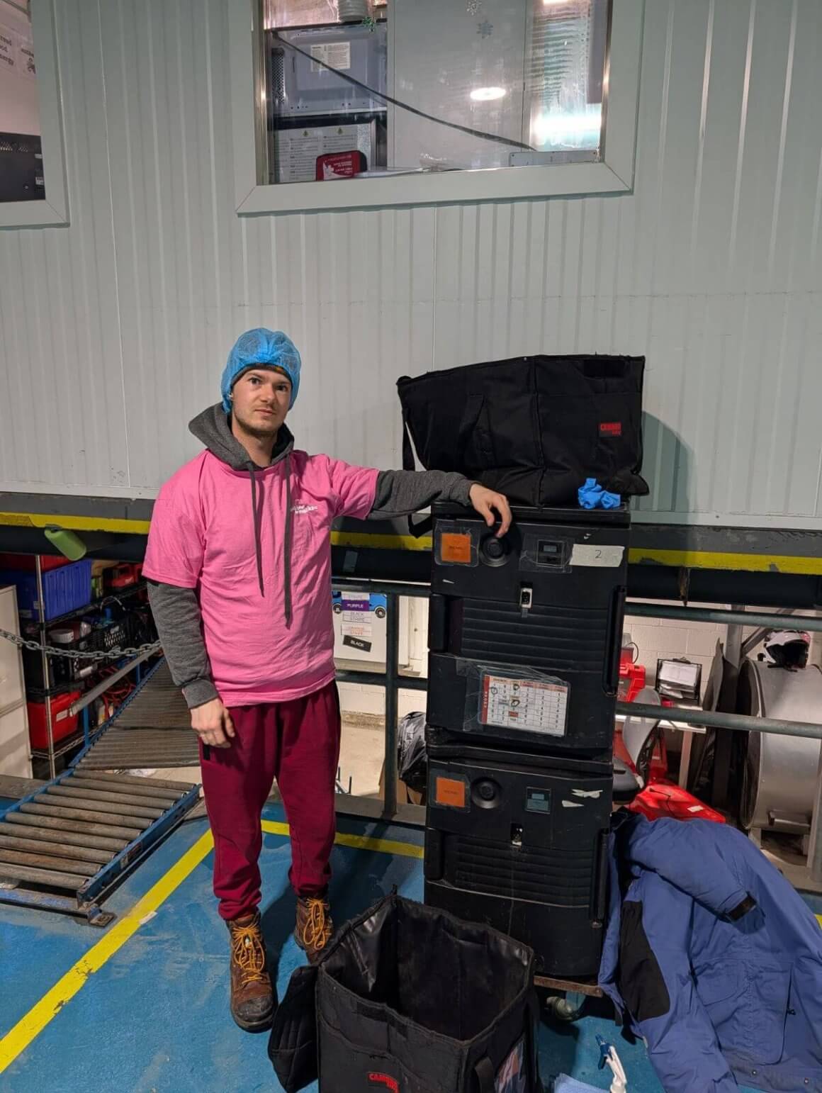 rfrk employee wearing pink shirt posing for pink shirt day