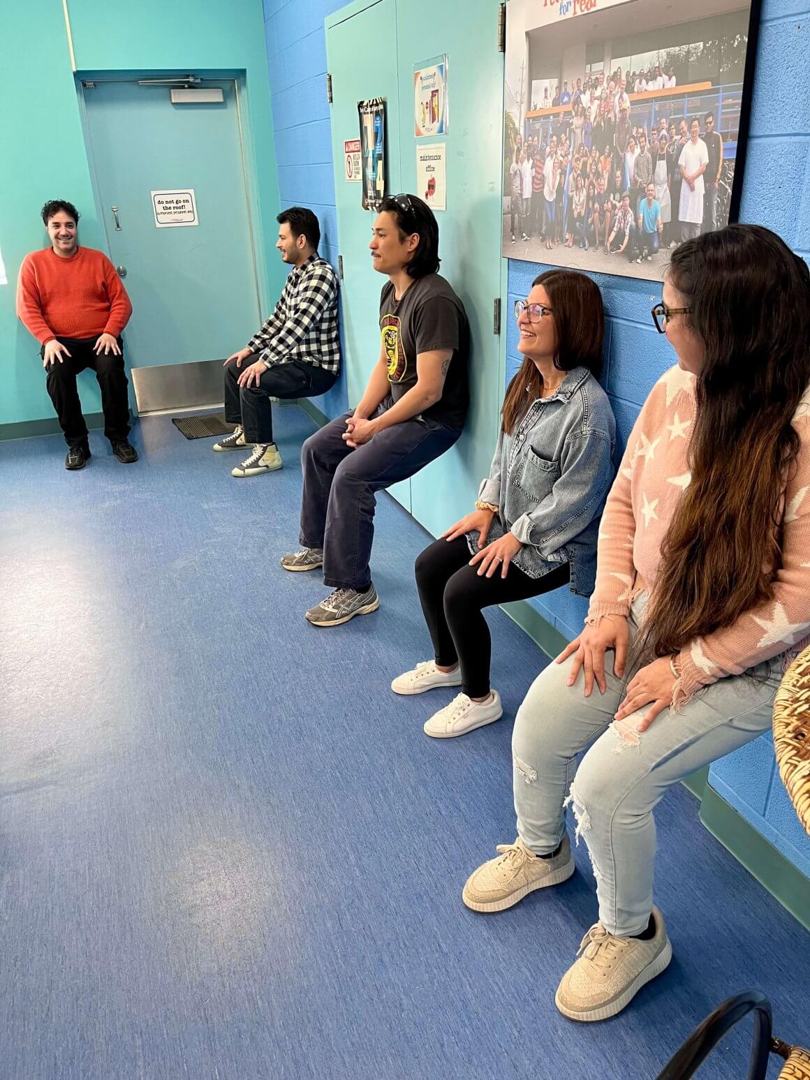 rfrk team performing the wall sit challenge