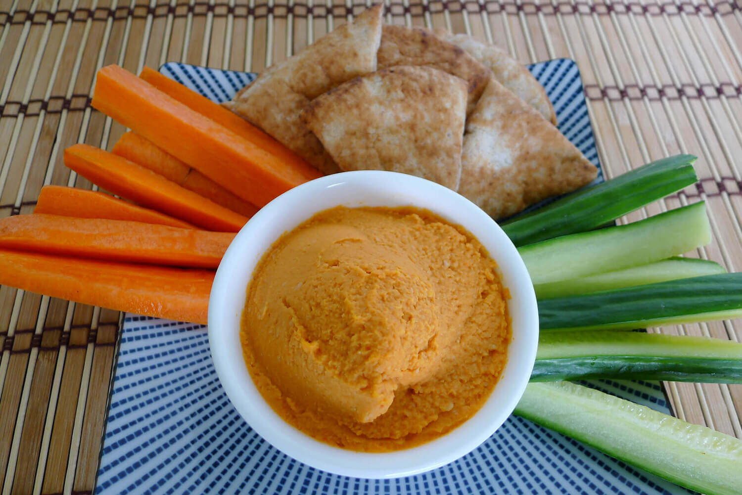 recipe release: red pepper hummus! 1 rfrk red pepper hummus served with pita and matchstick veggies