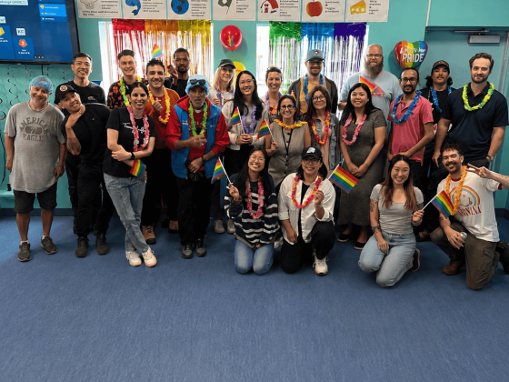 rfrk pride party group shot in staff room