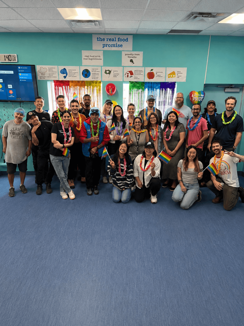 rfrk pride party group shot in staff room