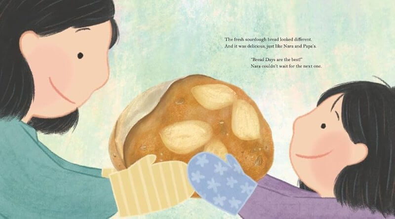 inside cover art for bread days by hannah chung showing a mom and daughter holding up a loaf of sourdough bread